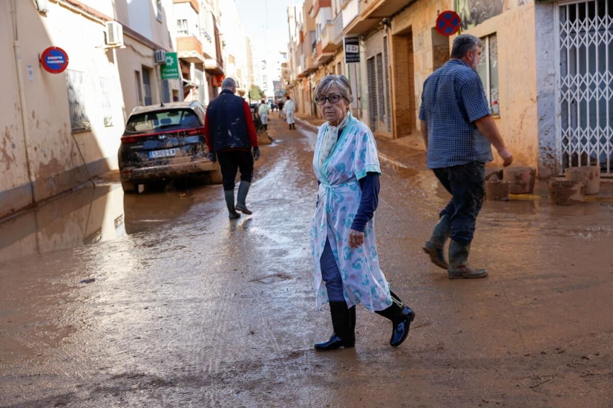 İspanya'nın Selden Kurtulanları Fotoğraflarını ve Anılarını Kurtarmaya Çalışıyor