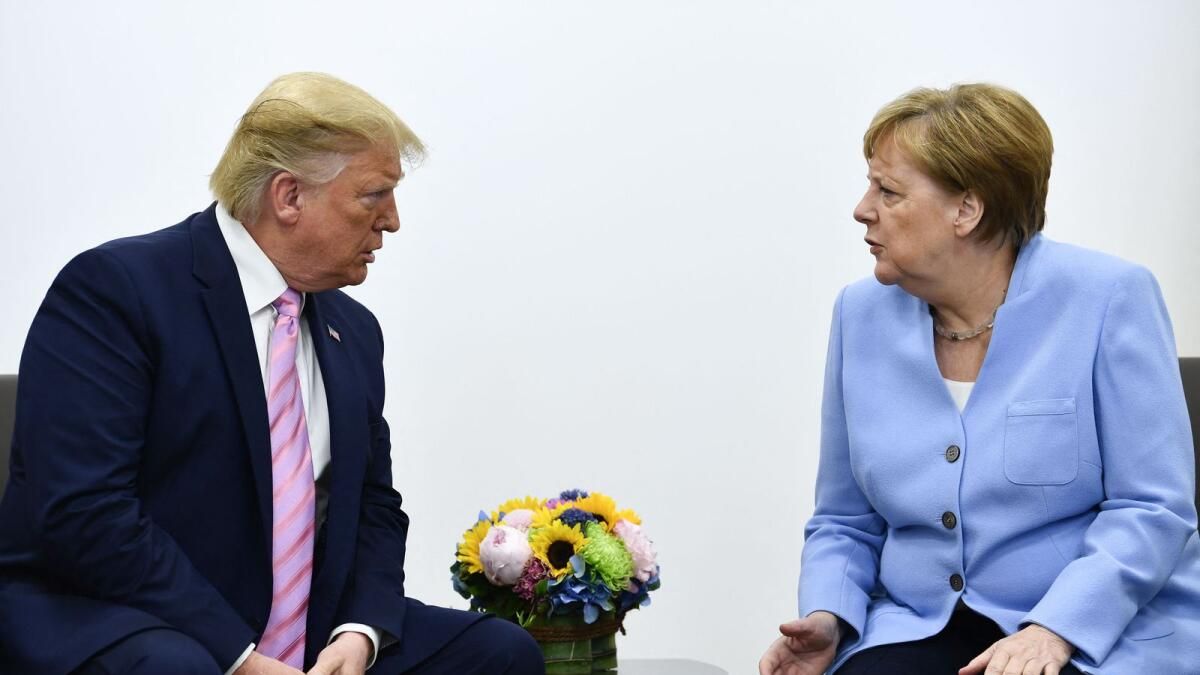 Merkel Anılarında Trump'ın Diktatörler Tarafından 'Büyülendiğini' Söyledi